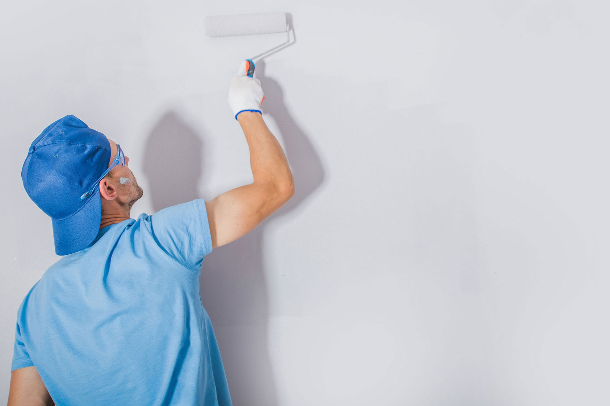 Man painting wall